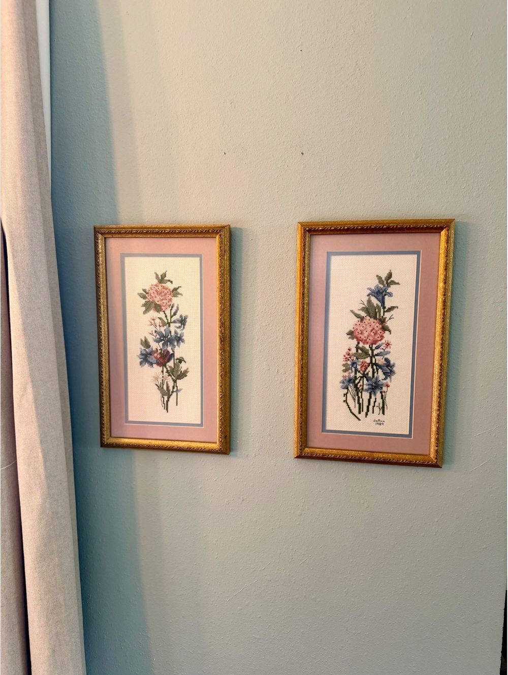 Vintage 1989 Floral Cross Stitch Pair Framed Wall Art Pink Blue Gold Frames